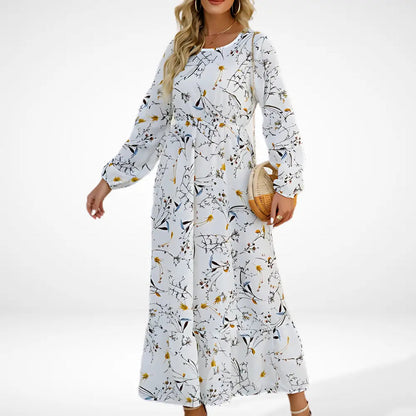 Loose long dress with floral print and long sleeves