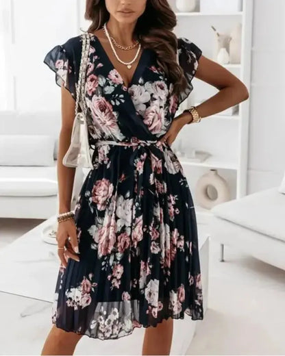 Pleated dress with floral print and belt