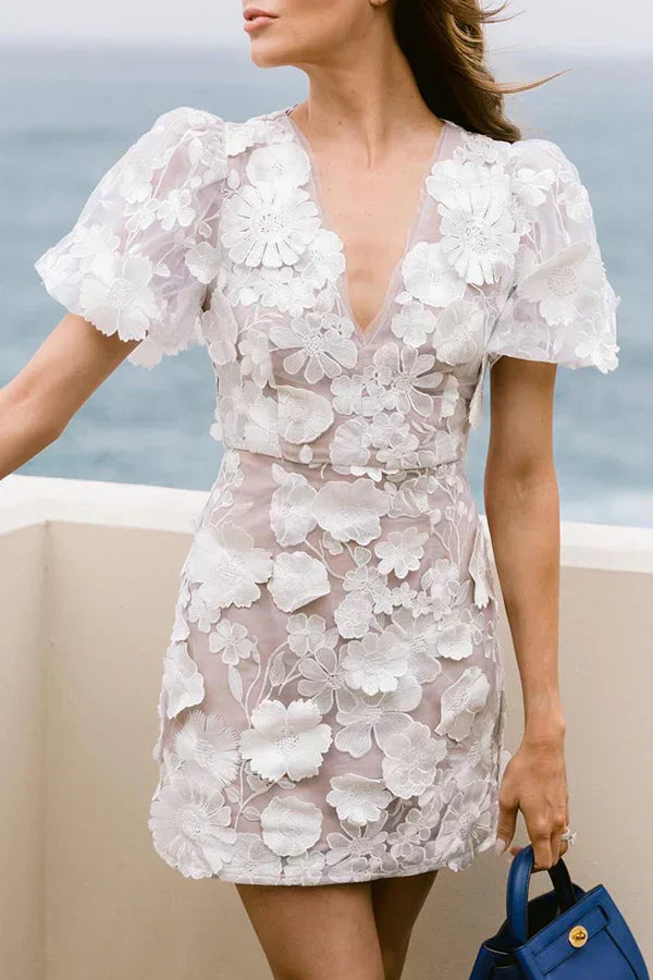 LD Lina - Floral dress with puff sleeves.