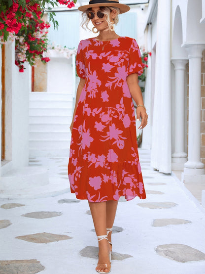 Floral midi dress with puff sleeves and ruffles at the hemline