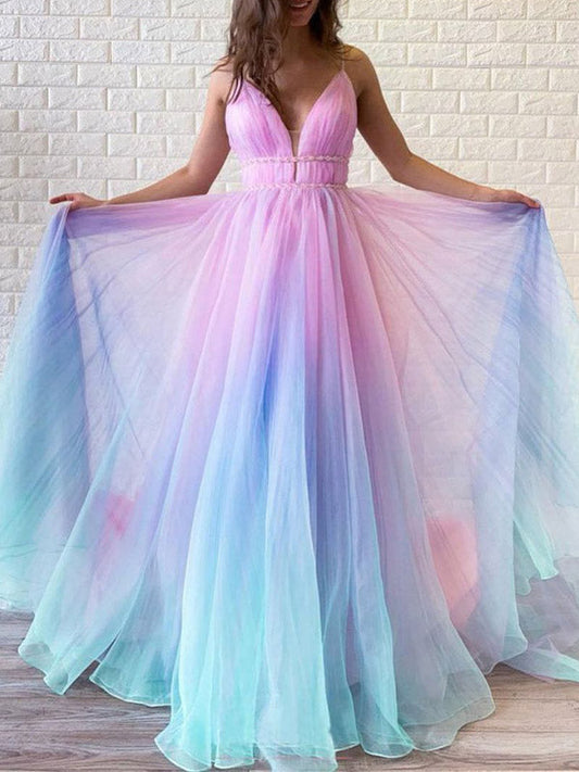 Elegant long evening dress with thin straps and gradient colors