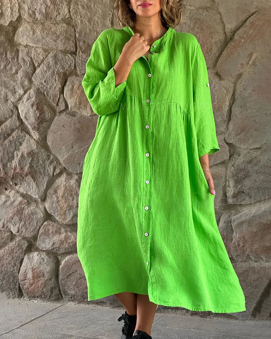 Mc | Loose shirt in a maxi dress with layered slit in batik look