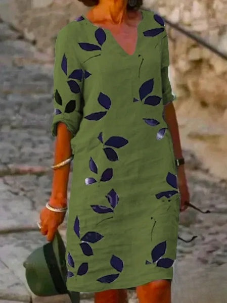 Mc | Basic dress with half sleeves and floral print.