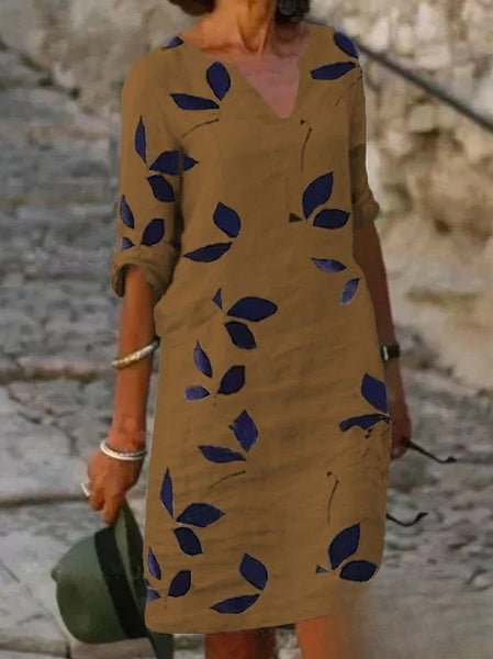 Mc | Basic dress with half sleeves and floral print.