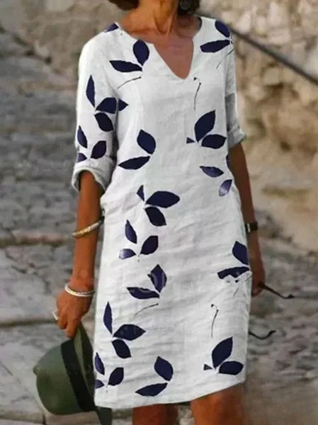 Mc | Basic dress with half sleeves and floral print.