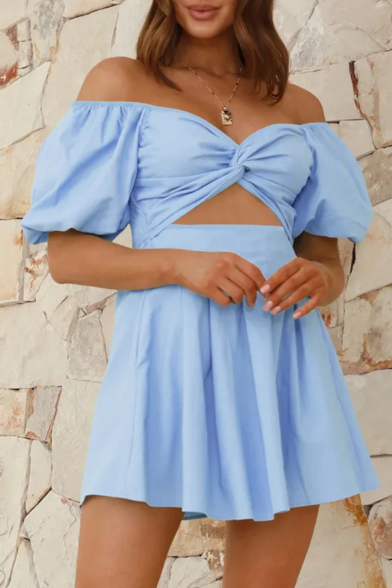 Celeste | Pleated dress with shoulder pads and lantern sleeves