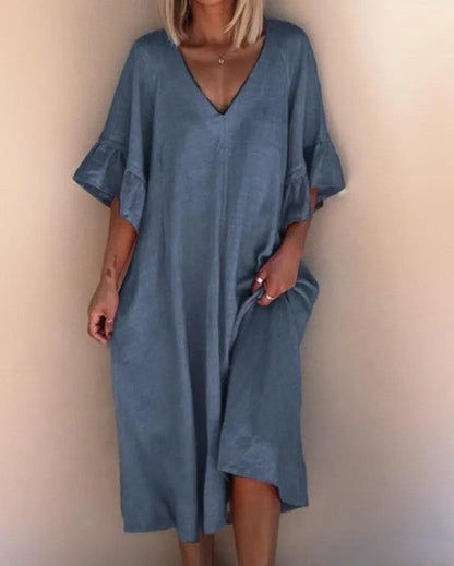 Mc | Sleek, loose-fitting dress with plain V-neckline