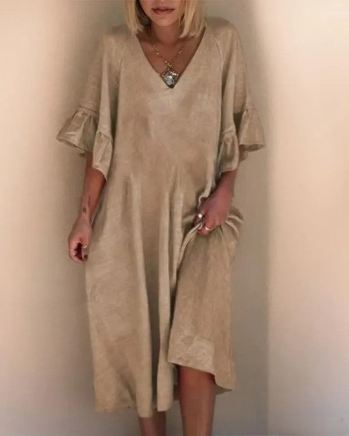 Mc | Sleek, loose-fitting dress with plain V-neckline