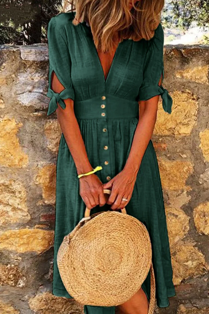 Mc | Elegant casual dresses with V-neck and buckle closure.