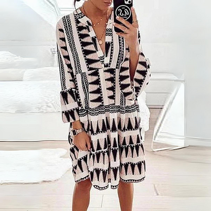 Mc | Dress with animal print and puff sleeves