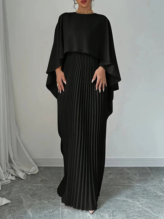 Long pleated dress with flowing detail for elegant occasions