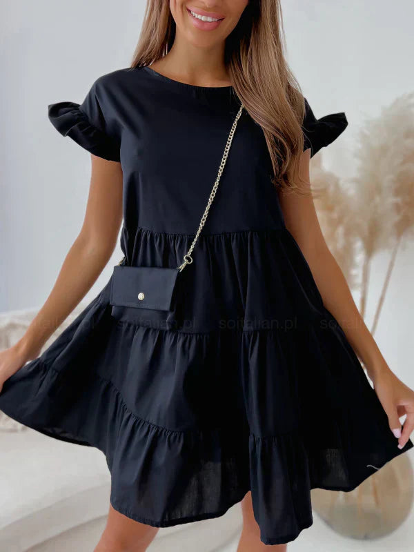 Dresses with wide sleeves and round neckline and irregular hemline