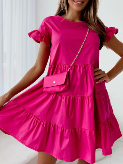 Dresses with wide sleeves and round neckline and irregular hemline