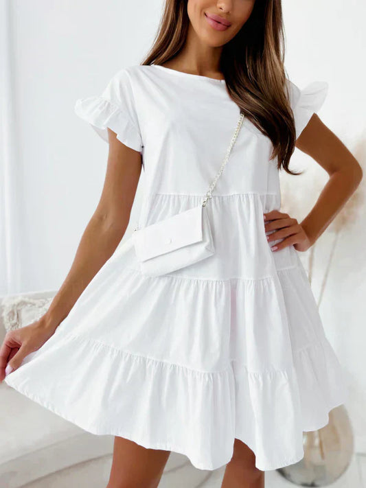 Dresses with wide sleeves and round neckline and irregular hemline