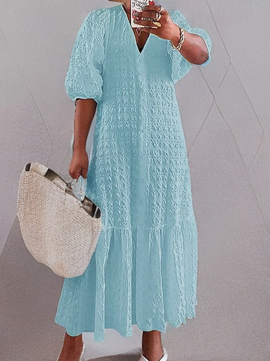 Mc | Casual dress with pleated buttons.