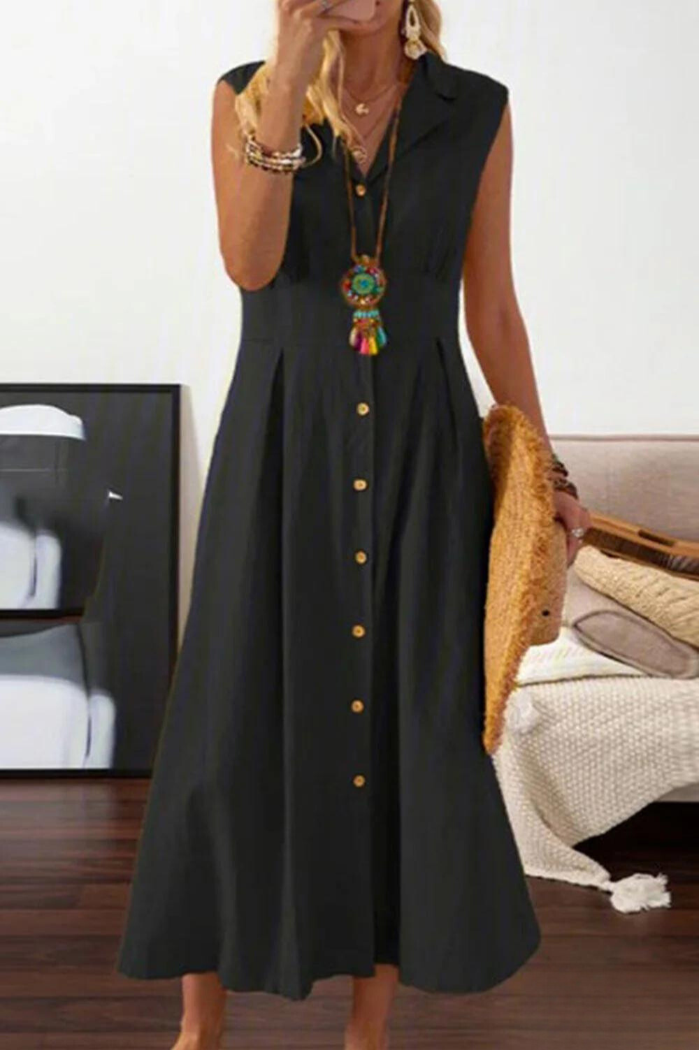 Mc | sleeveless midi dress with overlapping buttons.