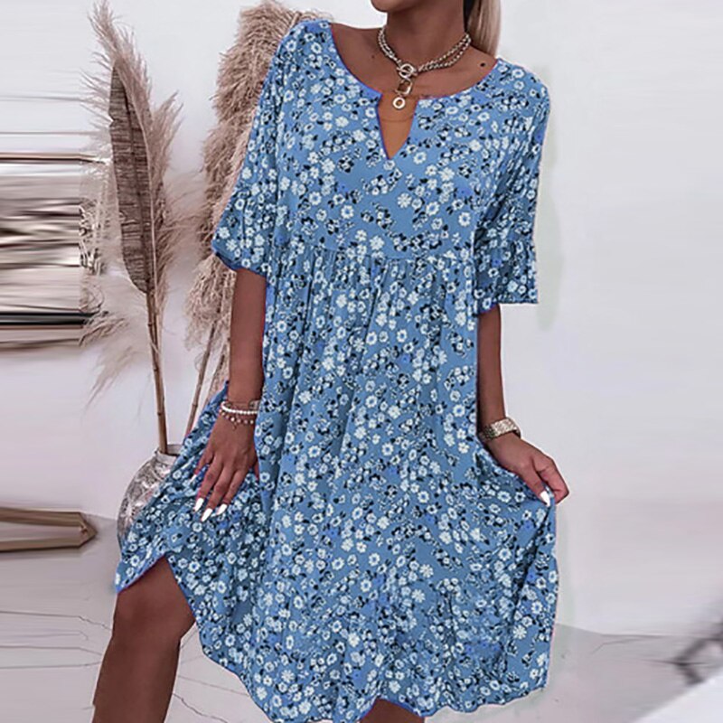 Dress with floral pattern and O-neckline