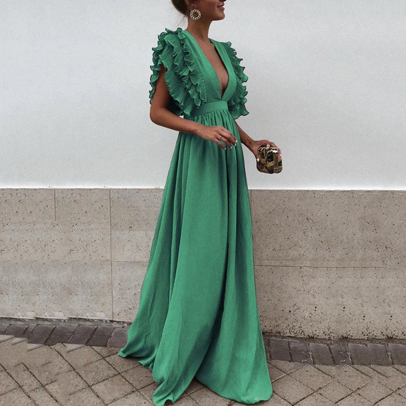 Elegant long dress with a deep neckline and short sleeves with ruffles