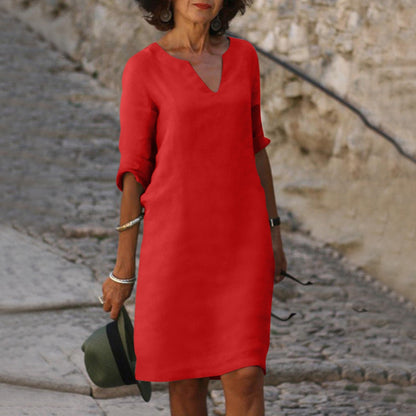 Elegant classic knee-length dress with three-quarter sleeves