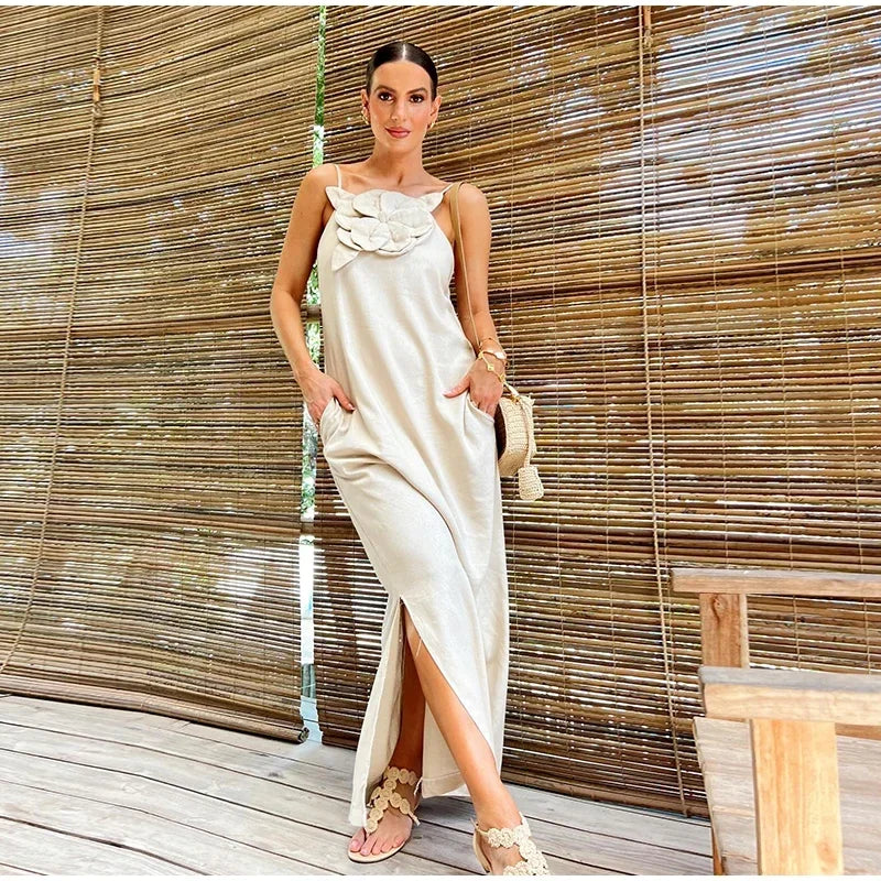 Mc | Maxi dress with slit and pockets in linen blend with floral decoration