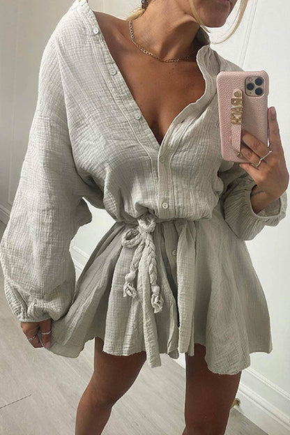 Wrinkled dress with buttoned belt