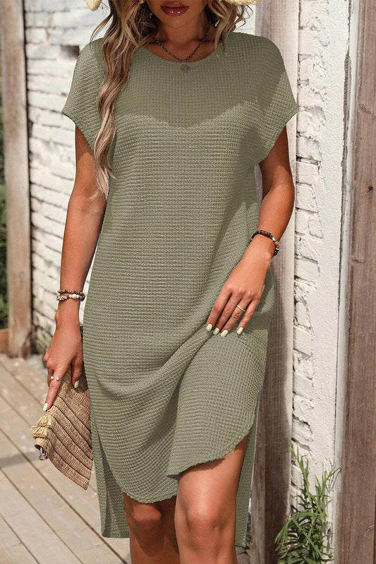 T-shirt dress - Rounded hem and side slit for easy movement