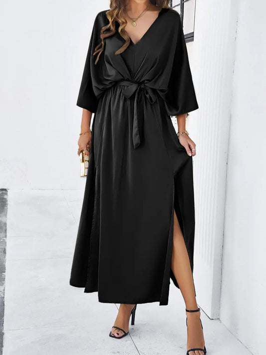 Elegant long dress with bat sleeves and belt