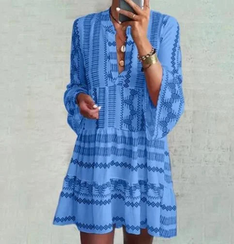 Loose-fitting dress with nine-point sleeve seams