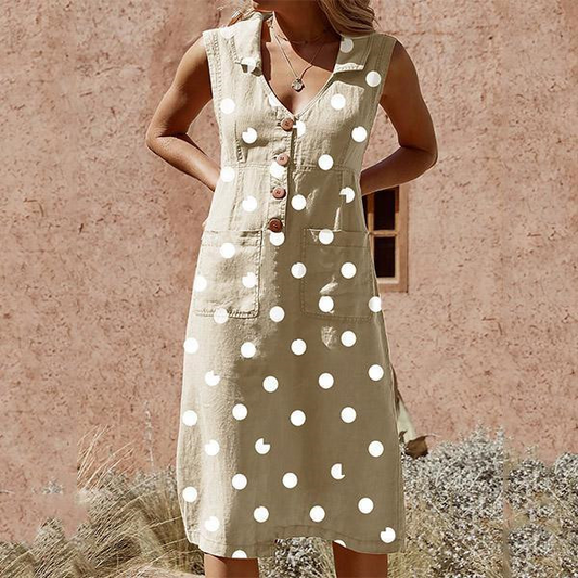 Elegant dress with pockets and polka dots, buttoned, in large size