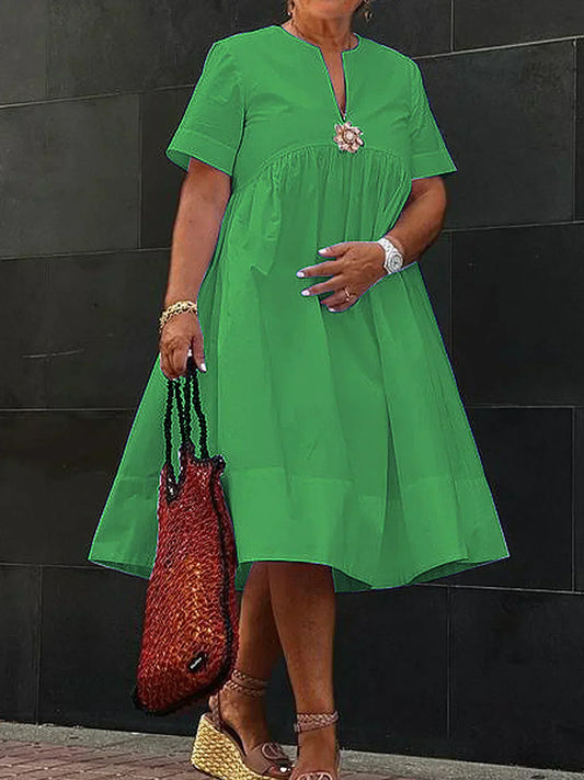 LP | One-color midi dress with flower brooch