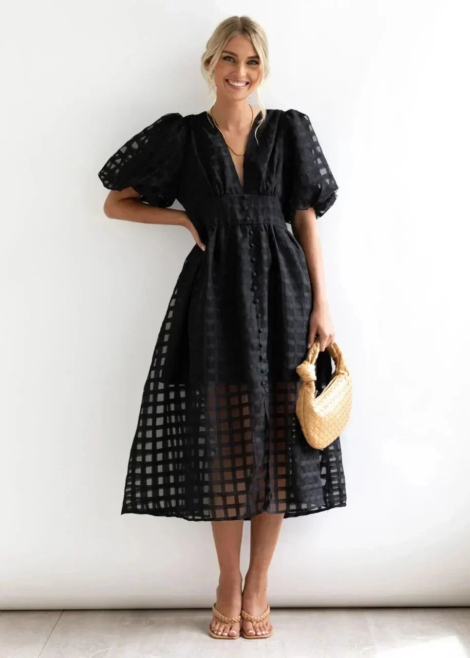 Checkered dress with ruffled sleeves