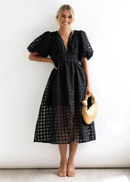 Checkered dress with ruffled sleeves