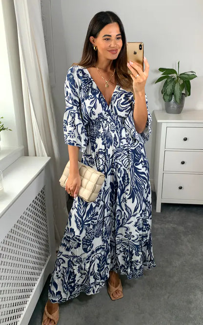 LD Long dress with V-neck and floral print in blue and white