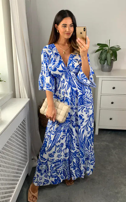 LD Long dress with V-neck and floral print in blue and white
