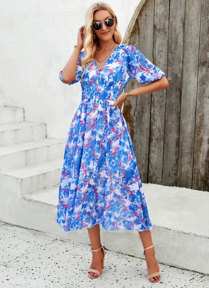 Elegant long dress with V-neck and subtle print