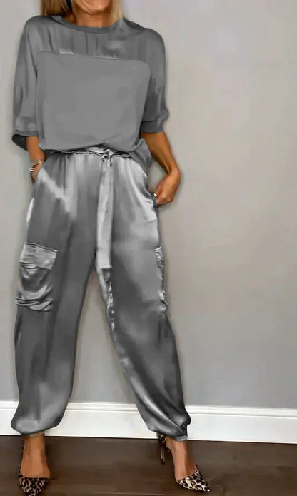 Kleya - Smooth satin two-piece suit with mid-length top and pants for women