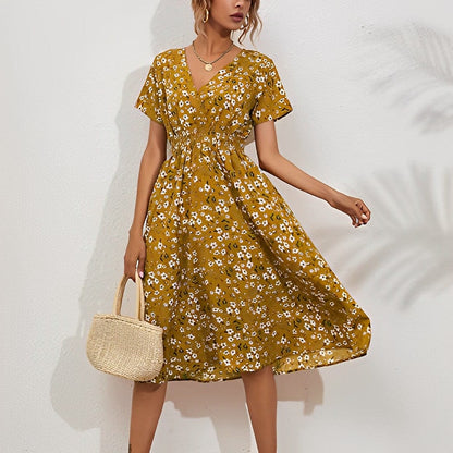 LP | Com��r - Elegant knee-length dress with floral pattern