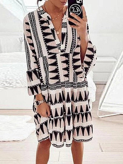 LD Printed dress with long sleeves and a loose V-neckline