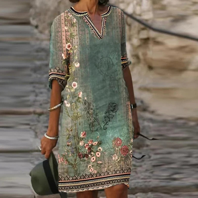 LP | Green midi dress with v-neck and floral pattern