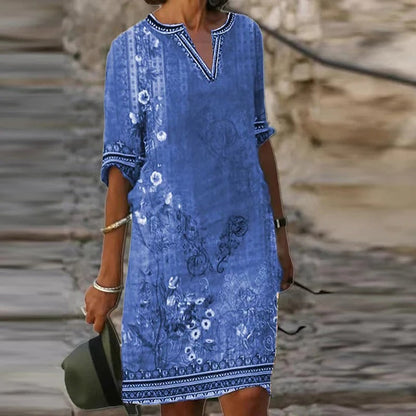 LP | Green midi dress with v-neck and floral pattern