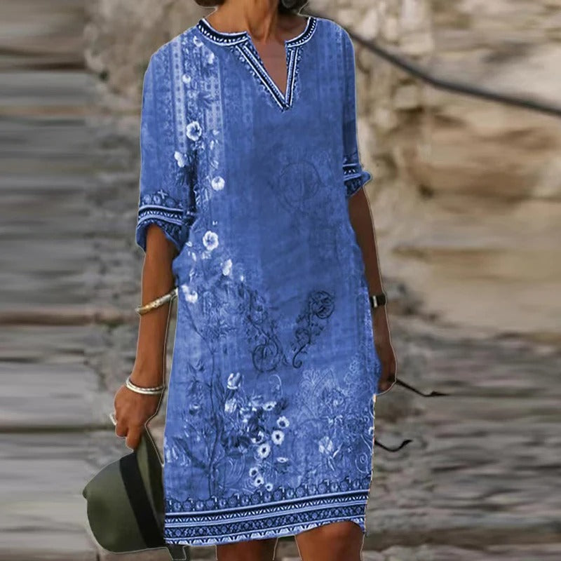 LP | Green midi dress with v-neck and floral pattern